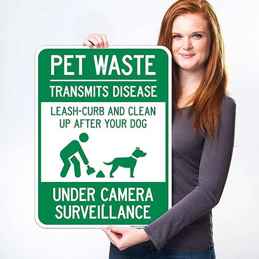 Pet Waste Leash-Curb and Clean Up After Your Dog Under Camera Surveillance Sign, (SI-63188) 18x24 Inches, Rust Free .063 Aluminum, Fade Resistant, Made in USA